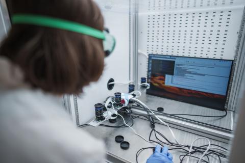 UNH Researcher in a lab