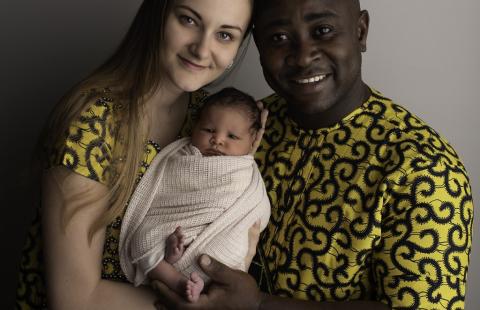 Denisa and Norbert Okolie with baby Joy.