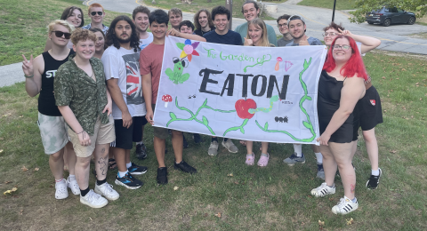 Eaton residents with a colorful sign