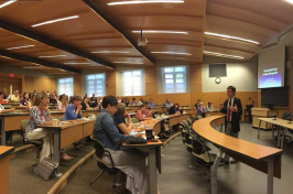 NH state legislator Thomas Sherman talks to UNH students