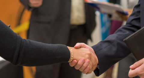 people shaking hands