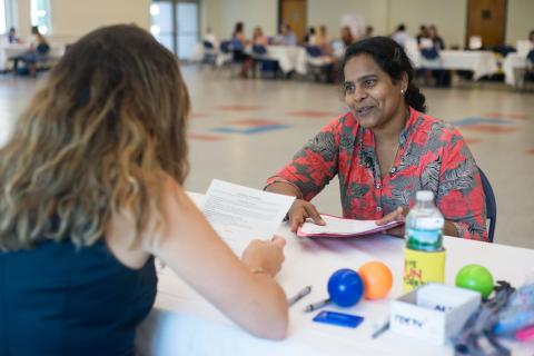 Image of student meeting with employer during UNH's Resume Review Day