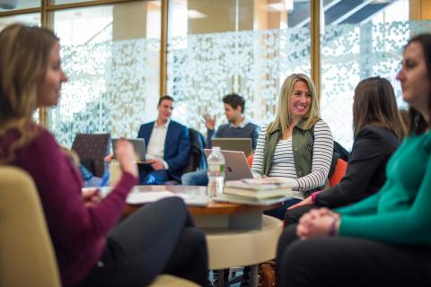 Image of a alumni mentors and students networking together at a Wildcat Connections event
