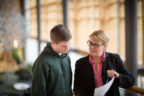 Image of Career Director advising University of New Hampshire student