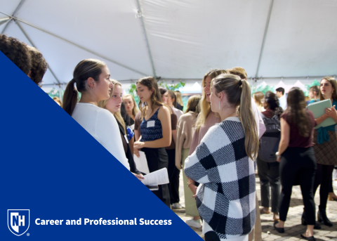 Students interacting at Paul Networking Night with CaPS logo in bottom left corner