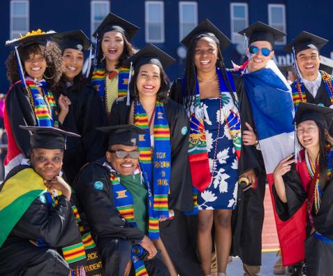 students posing for graduation photo