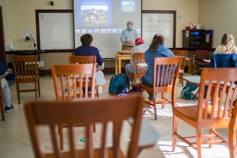 Professor McMahon teaching in a classroom