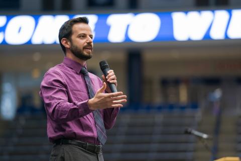 dean speaking to students at orientation