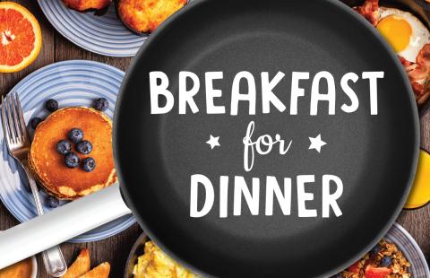 Breakfast for dinner text on a skillet with breakfast foods in the background