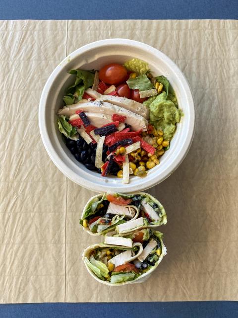 Bowl of salad and a wrap from Creative Greens