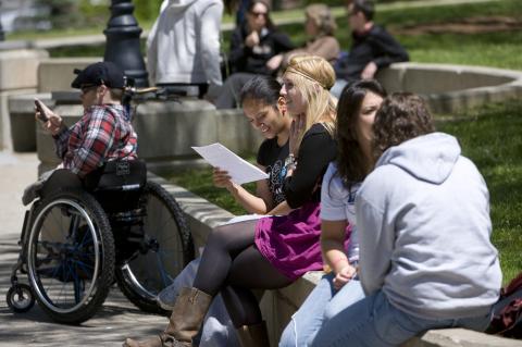 Student in a wheelchair on the quad