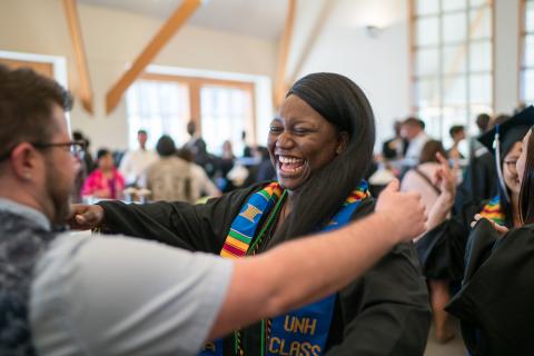 Students hugging pre-commencement ceremony