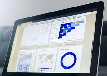 computer screen showing graphs and stats