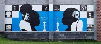 wall mural 2 men facing each other with chess pieces