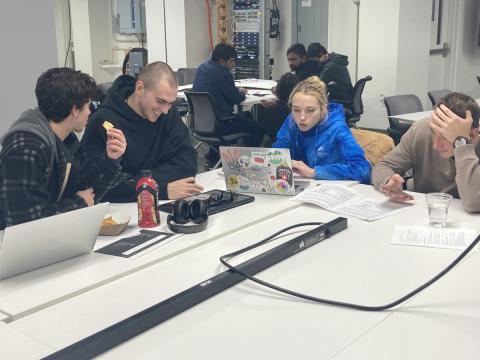 ideathon participants brainstorming around a table