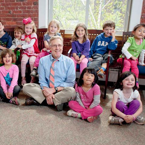 A teacher with young students