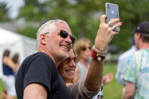 UNH alumni taking a selfie at reunion