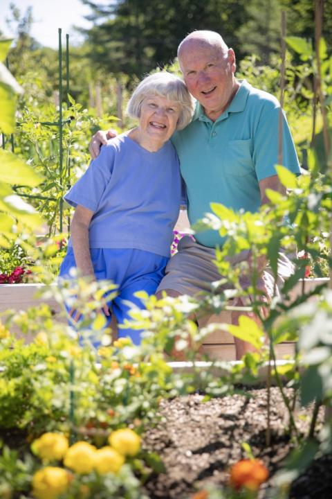George and Cathy Wilson in a garden
