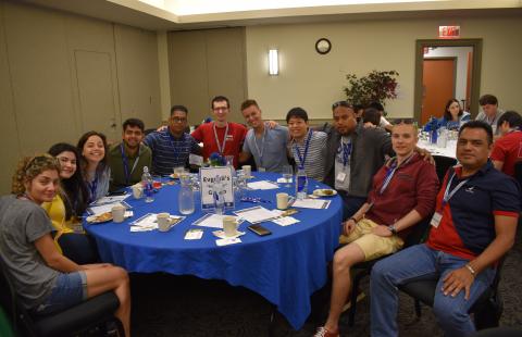 international students sitting at a round table