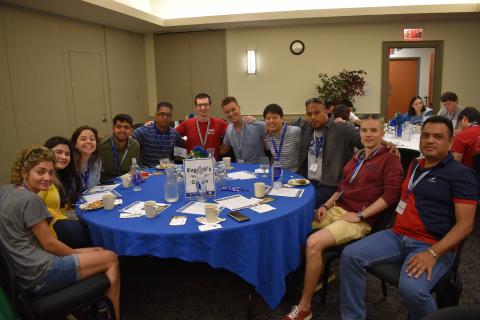international students sitting at a round table