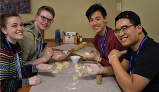 GLE students making dumplings