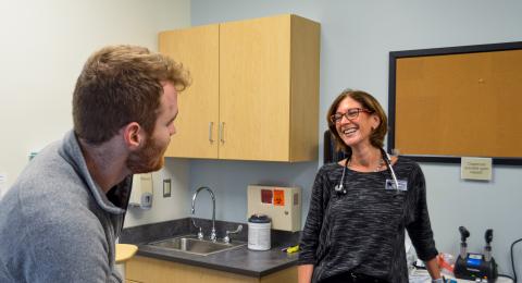 Patient and smiling health provider in a conversation 
