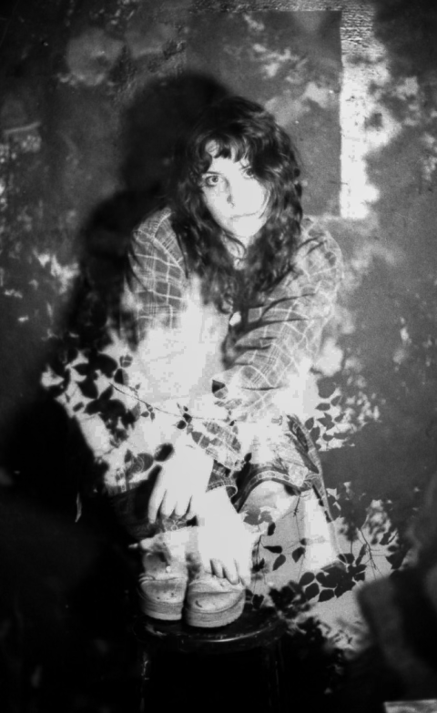 A black and white photo of a person