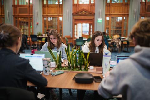 Students studying in the Huddleston ballroom