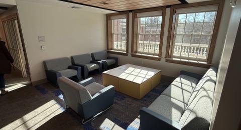 Photo of a lounge space in Hetzel Hall showing couches and tables.