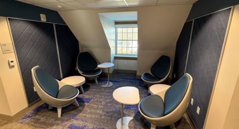 Photo of a lounge space in Hetzel Hall showing tables and chairs