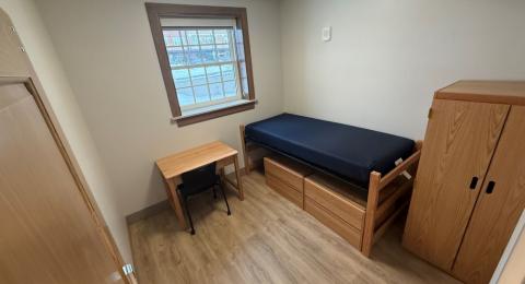 Photo of Hetzel Hall single room showing furniture.