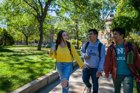 Students Walking Across Campus