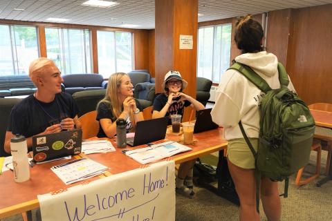 Resident Assistants at the front desk during move-in day