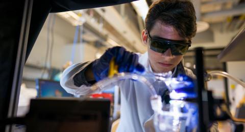 Samuel Mercer in UNH research lab