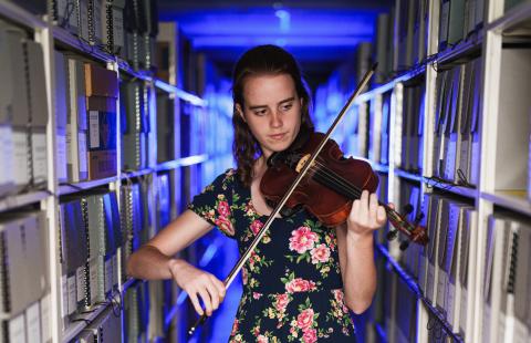 Emilie Carroll playing fiddle