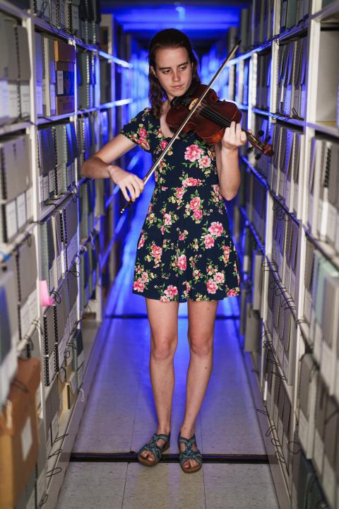 Emilie Carroll playing fiddle