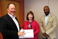 Ted Anglace (Sophos), Eileen Cooley (Prize Winner), and Stan Waddel (UNH CIO)