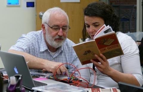 Teachers setting up an Arduino at the 2016 Summit