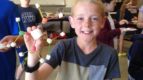 Boy with marshmallow STEM project