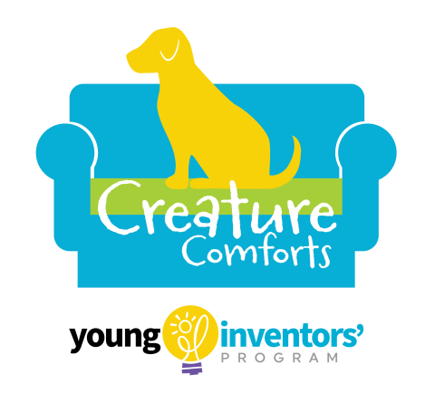 Creature Comforts- dog on sofa with YIP logo
