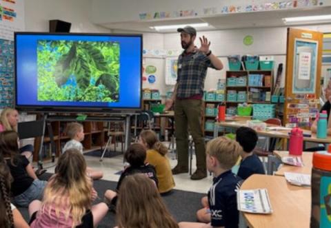 classroom with children learning about GLOBE