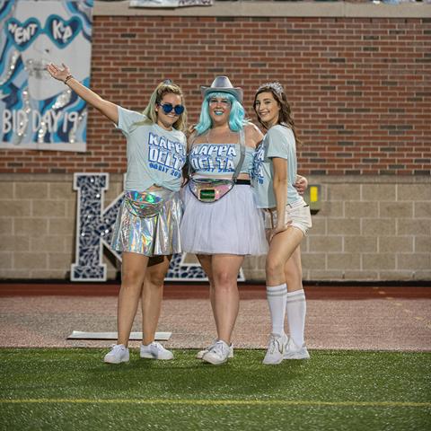 3 Kappa Delta women posing during Bid Night