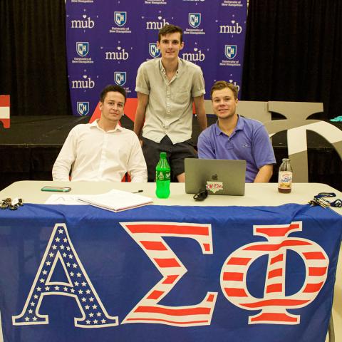 Fraternity brothers tabling