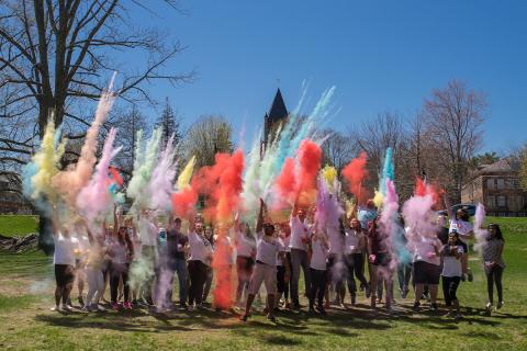 Students during Holi releasing colored powder
