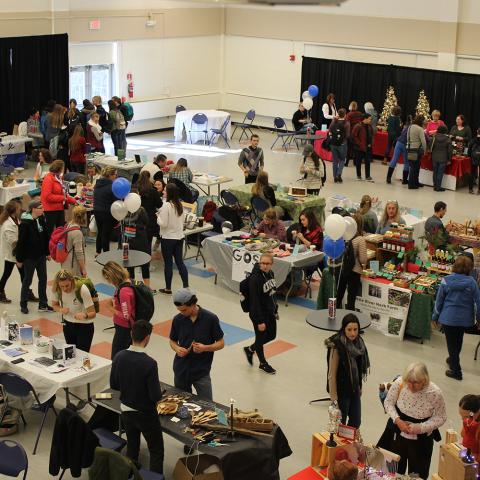 Overhead view of makers expo full of people