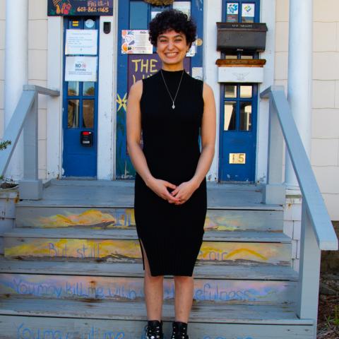 Student standing in front of Waysmeet Center