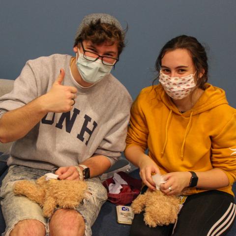 Students stuffing UNH Bears and Make and Take