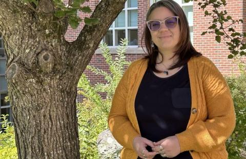 photo of grad student at UNH outside on campus