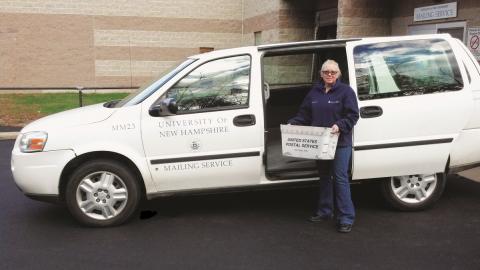 delivery worker picking up mail