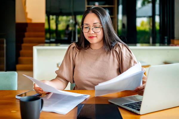 Person Reading Paper